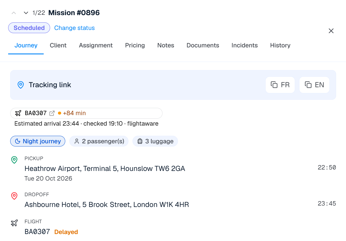 Trip detail with a tracked flight: status, verified estimated arrival time, pickup and route